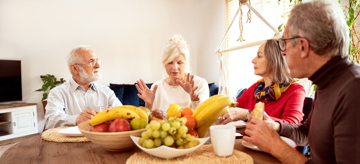 Two people in a warm conversation at home
