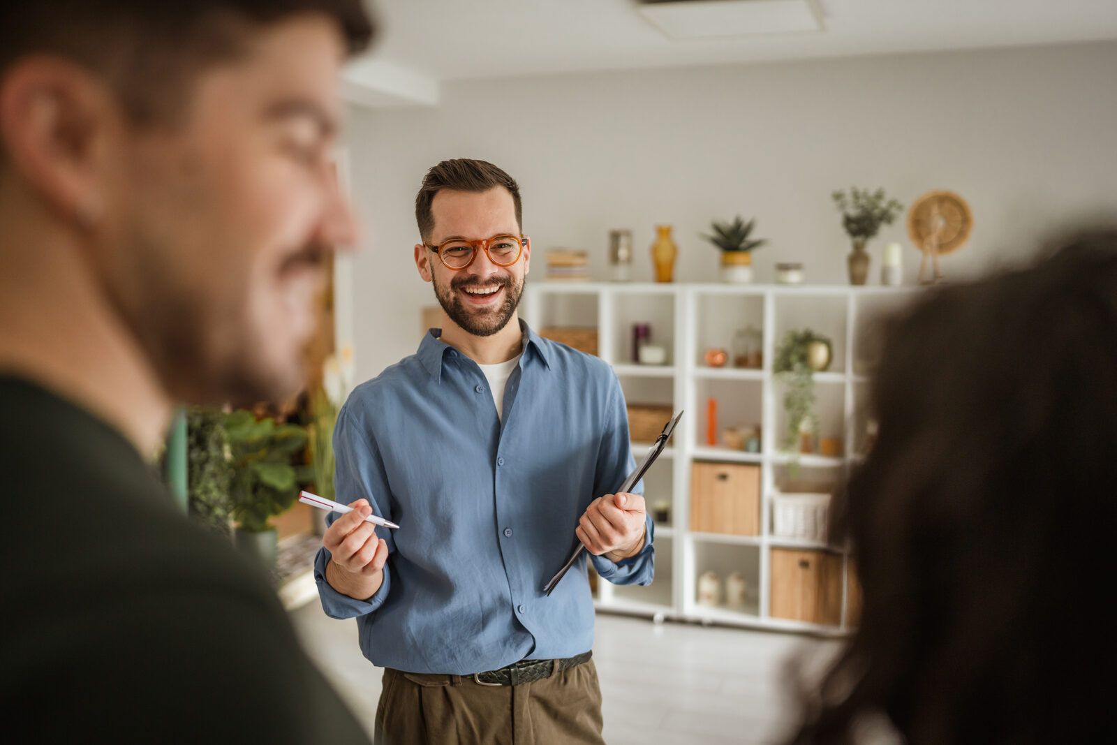 A case manager and property representative walking through a home together