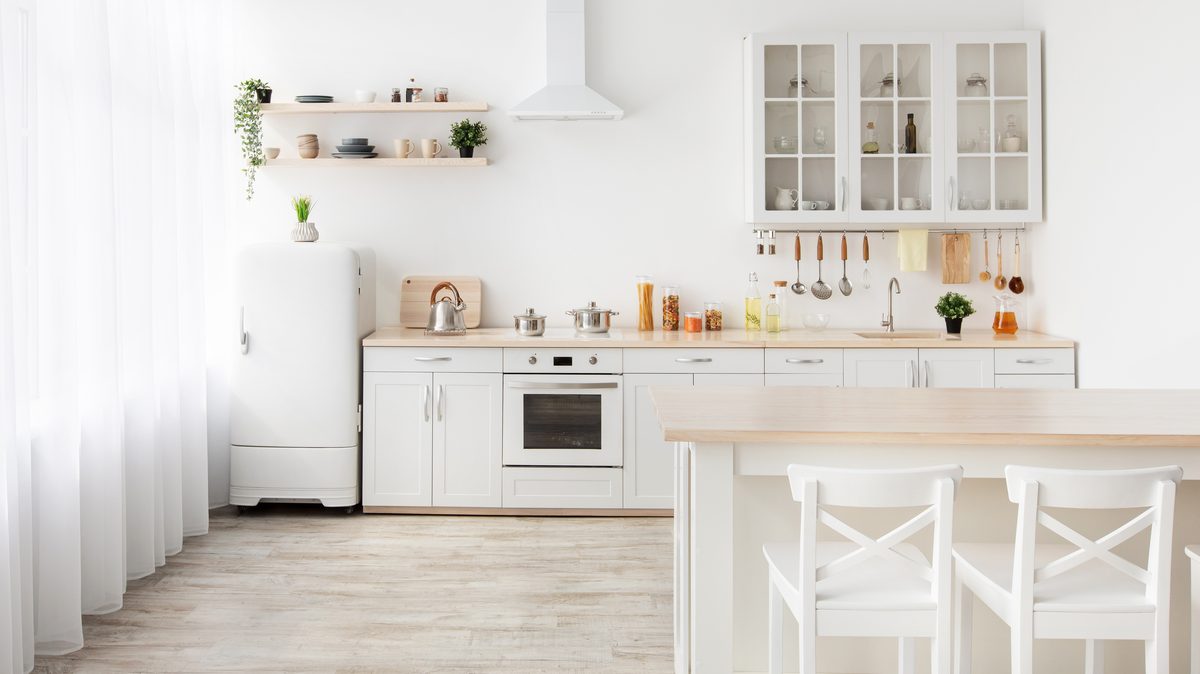 A kitchen and dining area in a shared home