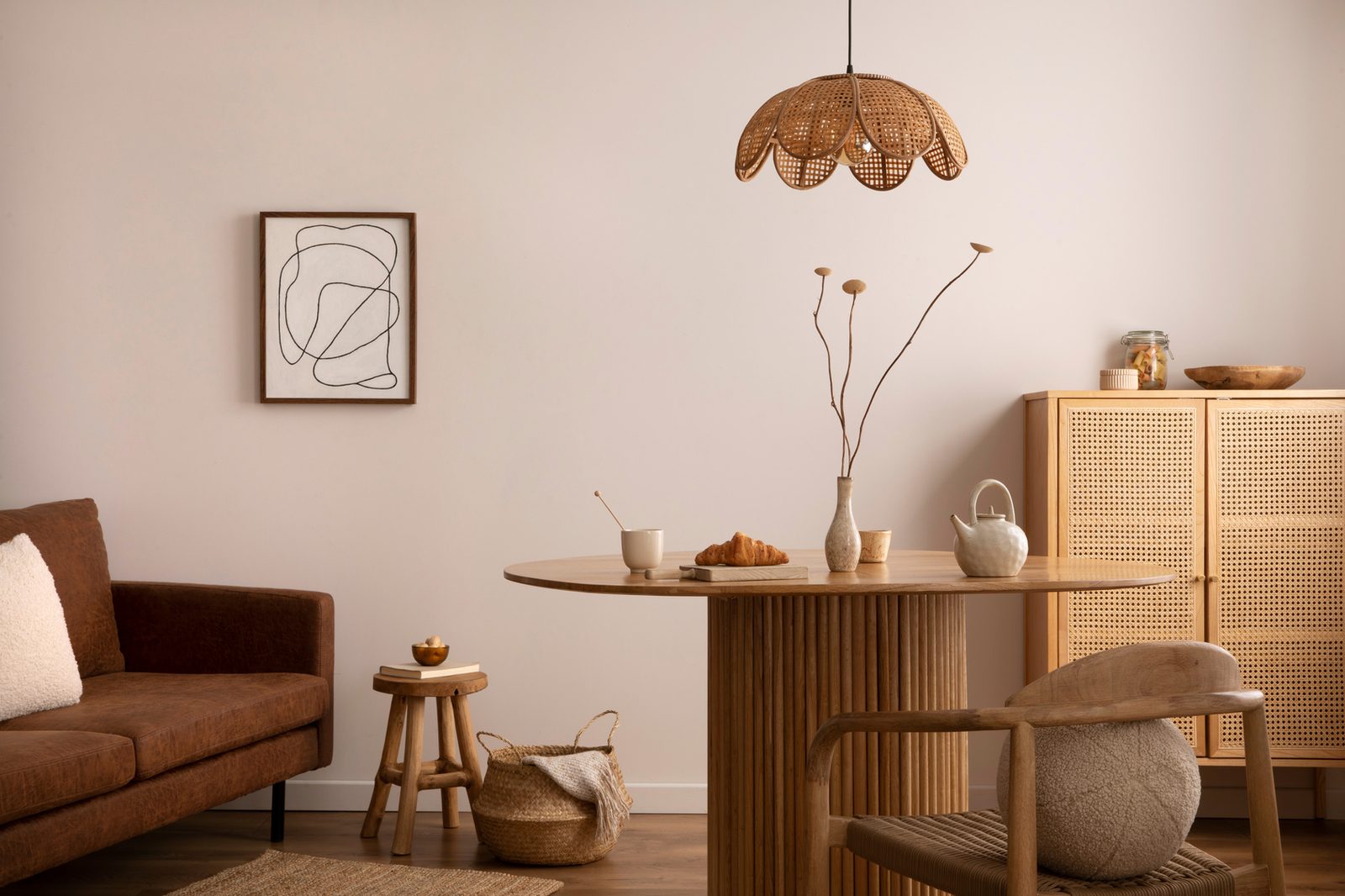 A warm, well-kept shared dining and living area furnished for long-term, multi-resident use