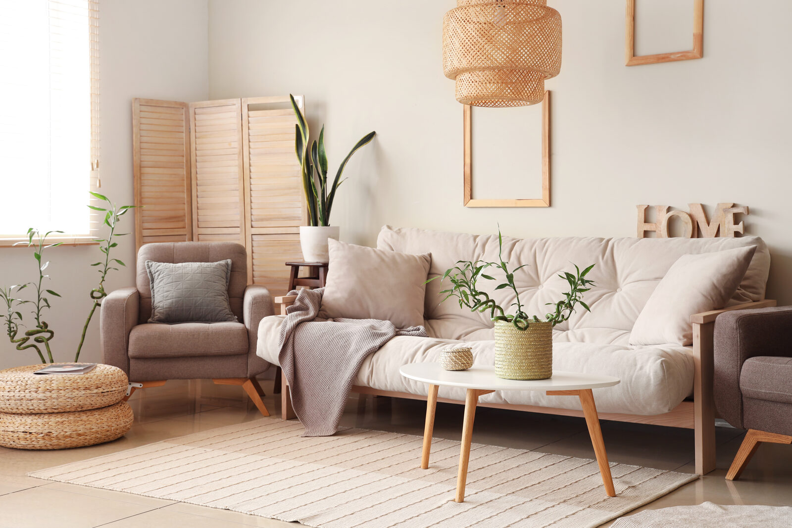 A bright, comfortable shared living room with a sofa and space to sit as a group